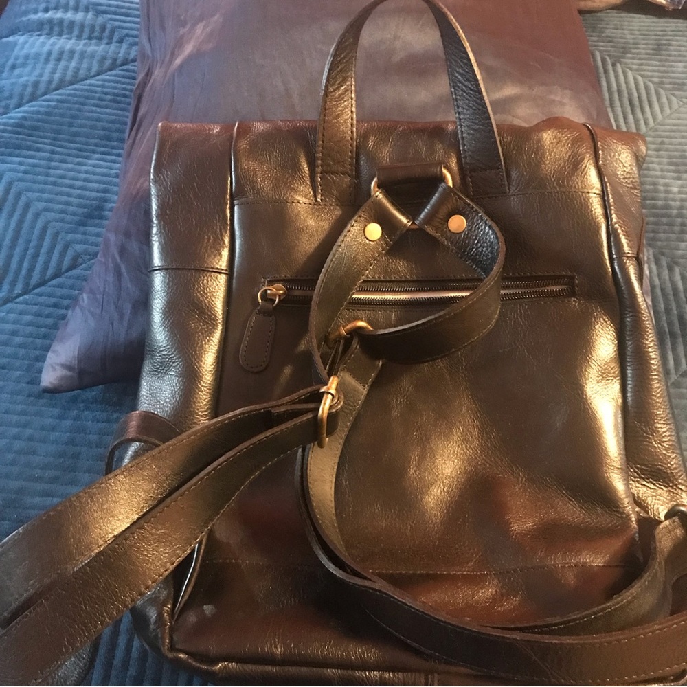 Black leather Italian. Find Pell. Perfect condition.